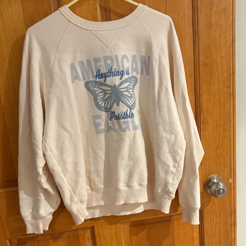American Eagle Outfitters Cream Hoodie with Blue Butterfly Print